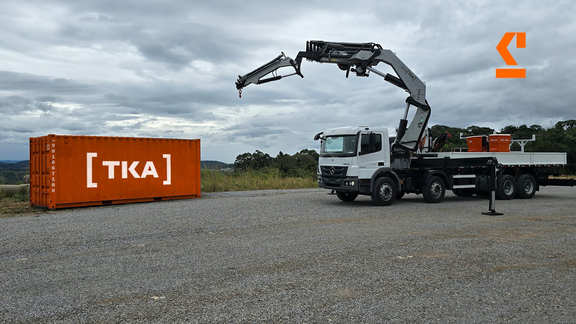 TKA truck-mounted crane lifting a load in a field application