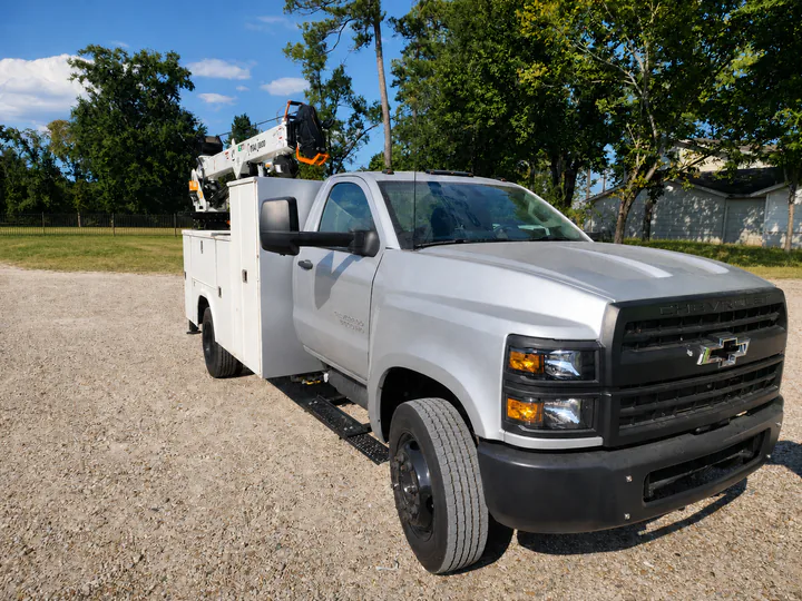 Front driver-side view of a Chevrolet Silverado 5500 HD service truck equipped with a TKA 8800 crane